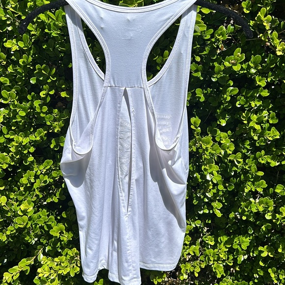 Orangetheory white tank with gold lettering and open slit in back - Picture 4 of 9